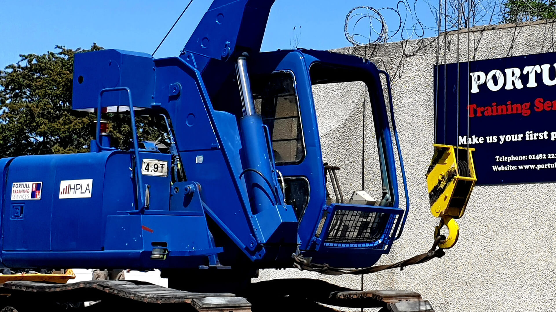 Heavy duty construction equiptment outside a training facility