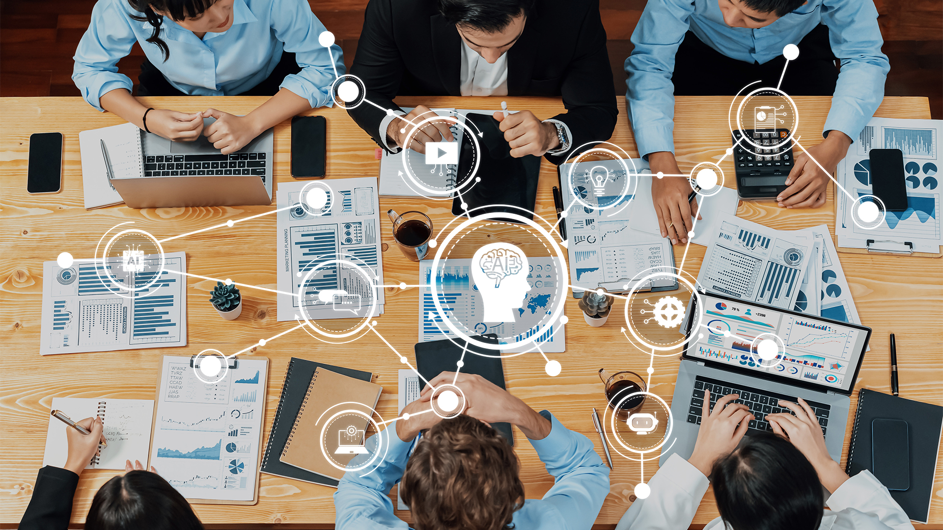 A dynamic team engages in data analysis and business strategy planning, utilizing advanced technology and collaborative tools to foster innovation in the workspace
