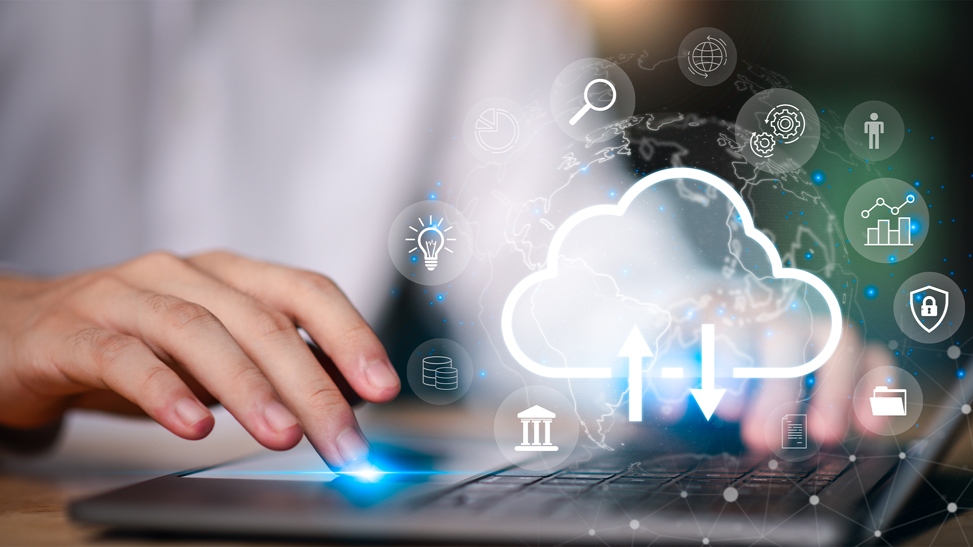 Hands typing on laptop with digital cloud icon, representing cloud computing
